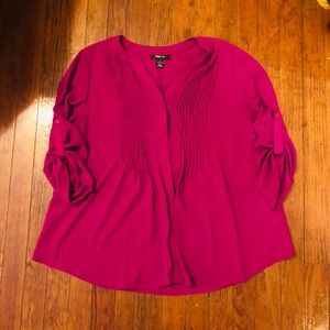 Magenta blouse.